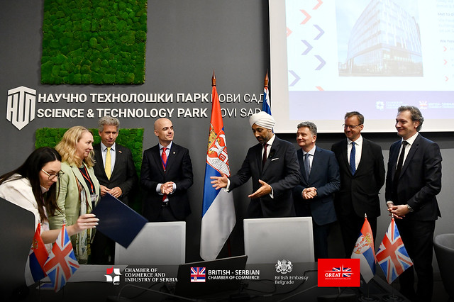 Officials at the signing table during a BSCC UK–Western Balkans event
